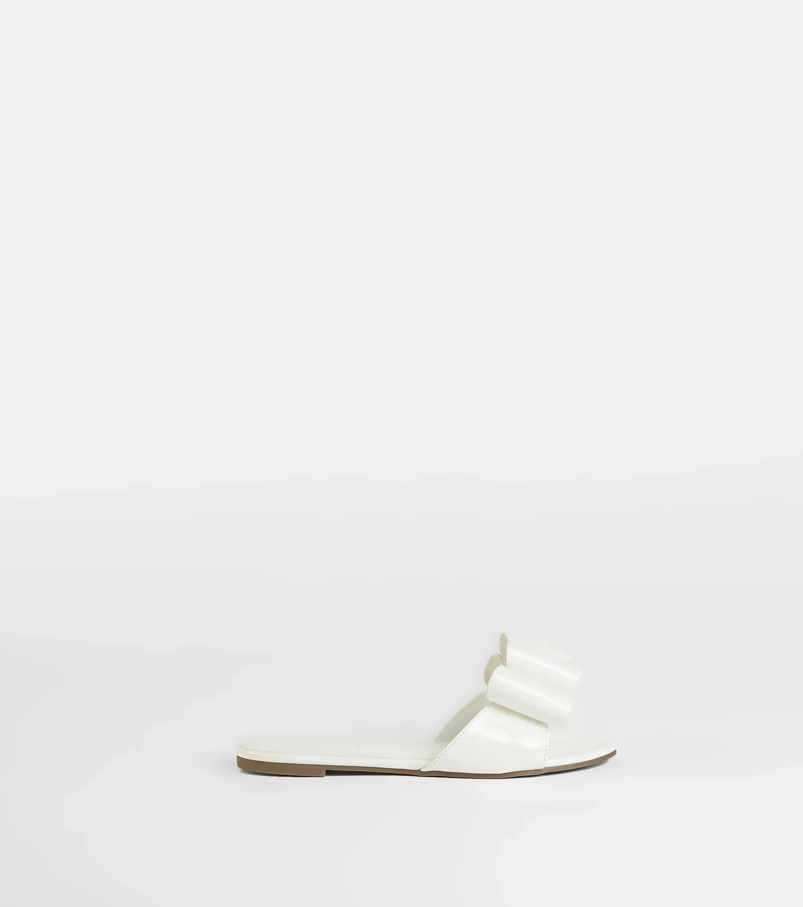 Charmed Intent Bow Sandals