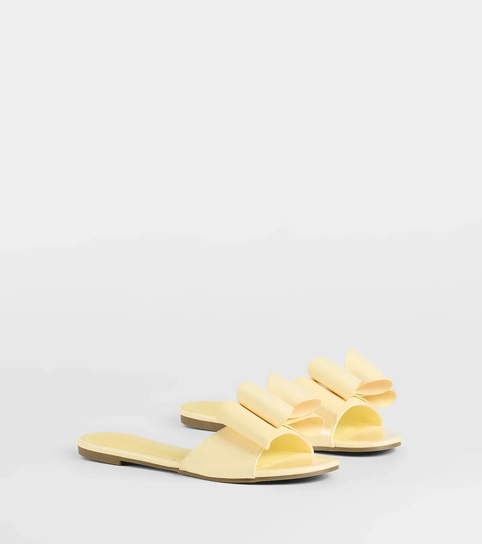 Charmed Intent Bow Sandals