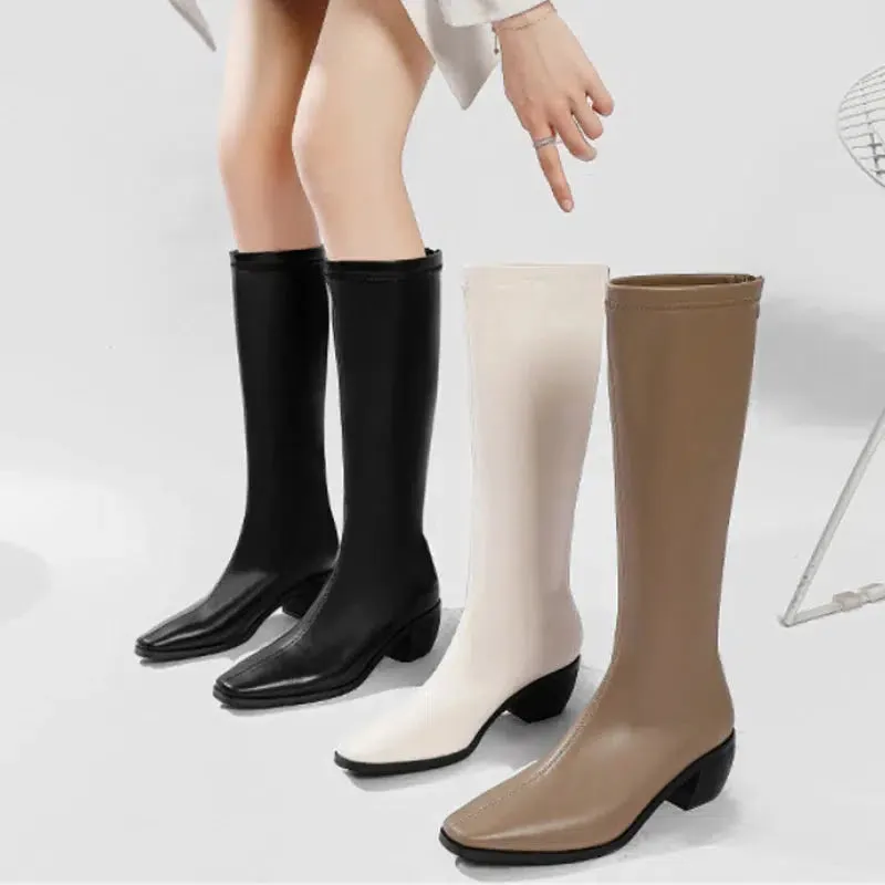 Flat heel pointed toe boots