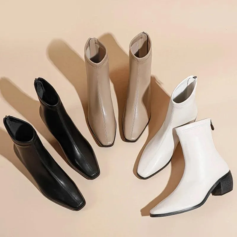 Flat heel pointed toe boots