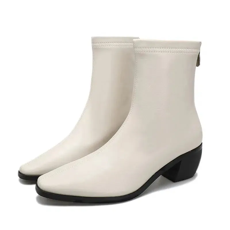 Flat heel pointed toe boots