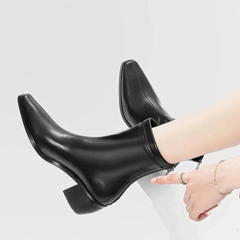 Flat heel pointed toe boots
